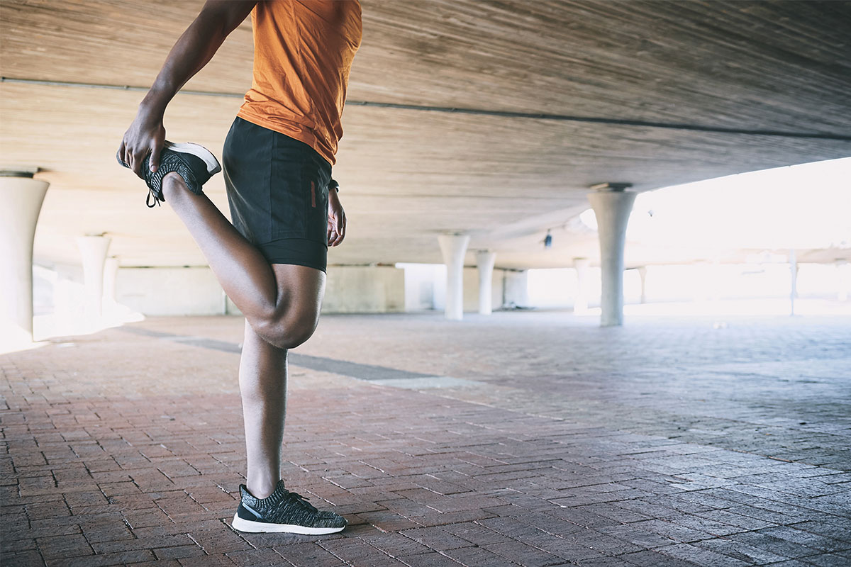 man stretching his legs